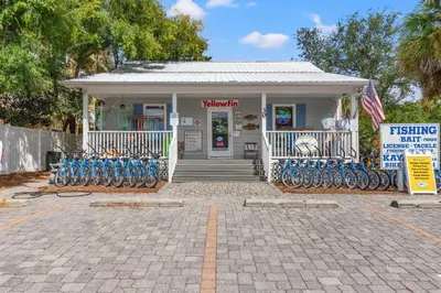 a building with bikes parked in front of it at Book This Top Rated Luxury Home in Seagrove Now! Private Pool! in Santa Rosa Beach