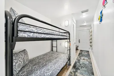 a bedroom with two bunk beds in a room at Grand Panama #2-1307 in Panama City Beach