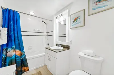 a bathroom with a toilet and a shower at Grand Panama #2-1307 in Panama City Beach