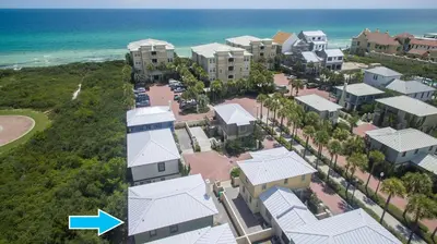 an aerial view of a resort with a blue arrow at Beach Music in Rosemary Beach