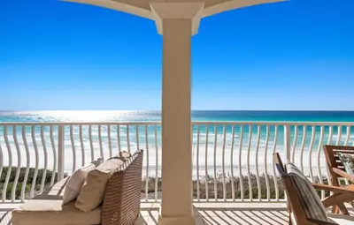 a balcony with a view of the beach and the ocean at Front Row in Inlet Beach