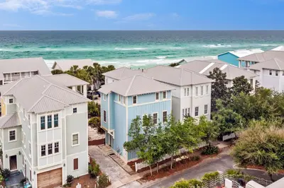 an aerial view of a row of houses on the beach at Blue Heaven in Santa Rosa Beach