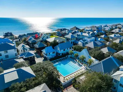 an aerial view of a resort with a swimming pool at Rosemary Renaissance in Rosemary Beach