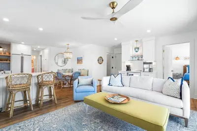 a living room with a couch and a table at After Dune Delight in Santa Rosa Beach
