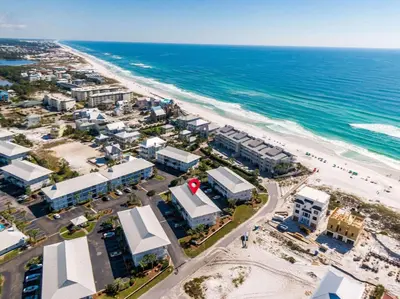 an aerial view of a beach with buildings and the ocean at After Dune Delight in Santa Rosa Beach