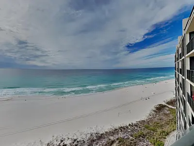 a view of the beach from the balcony of a condo at Edgewater Tower Iii 1109 in Panama City Beach