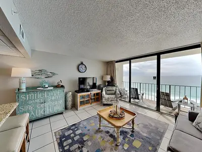 a living room with a view of the ocean at Edgewater Tower Iii 1109 in Panama City Beach