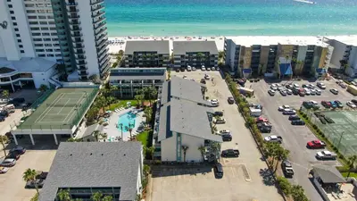 an aerial view of a city with a tennis court at Nautical Watch #D4 by Nautical Properties in Panama City Beach