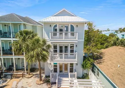 an aerial view of a white house with a balcony at Sea La Vie in Panama City Beach