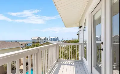 a balcony with a view of the ocean at Sea La Vie in Panama City Beach