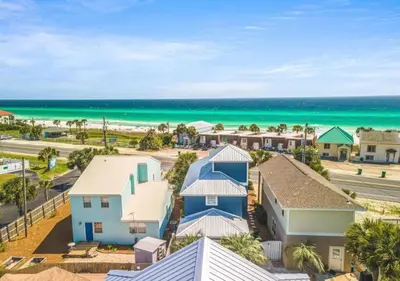 an aerial view of a house with the beach in the background at Sea La Vie in Panama City Beach