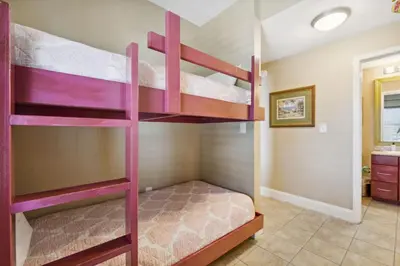 a bedroom with two bunk beds in a room at Laketown Wharf #1230 by Nautical Properties Vacation Rentals in Panama City Beach