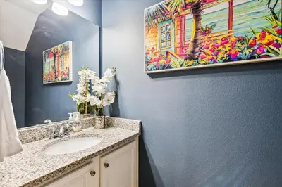 a bathroom with a sink and a mirror at 7664 Shadow Lake - Happy Horizons - 3 Bedroom Sleeps 9 townhouse in Panama City Beach