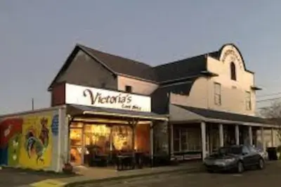 a store with a car parked in front of it at Stylish 3BR 2BA House Minutes from PCB - Book now in Panama City