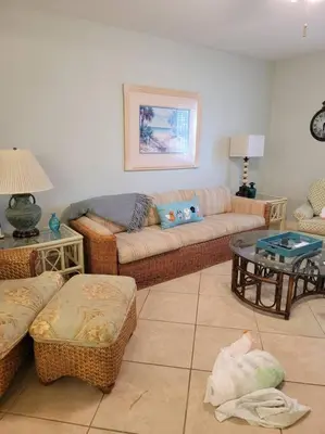 a living room with a couch and a table at 188WSD in Panama City Beach