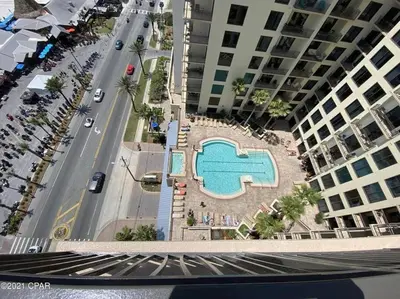an aerial view of a pool at a resort at Beautiful Beach Condo - luxury living at its best in Panama City Beach