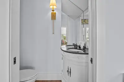 a bathroom with a sink and a toilet at Gulf Views, Large Private Pool, 30A, Two Kitchens in Seacrest