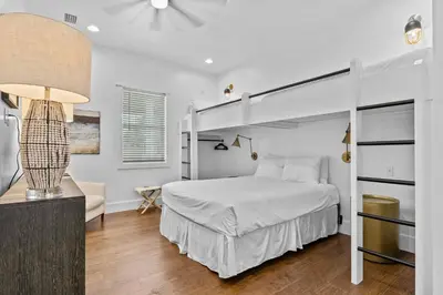 a white bedroom with a bed and a lamp at Gulf Views, Large Private Pool, 30A, Two Kitchens in Seacrest