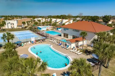 an overhead view of a swimming pool at a resort at Seaspray Hideaway Sleeps 8 Pools Beach Access in Panama City Beach