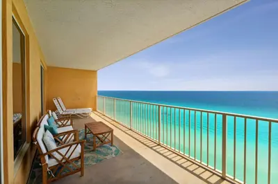 a balcony with a view of the ocean at Treasure Island #1502 in Panama City Beach