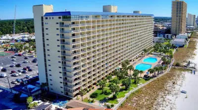 an aerial view of a large building next to a parking lot at Summit Beach Resort #1102 in Panama City Beach