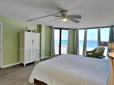 a bedroom with a bed and a ceiling fan at Edgewater Tower Ii 510 in Panama City Beach