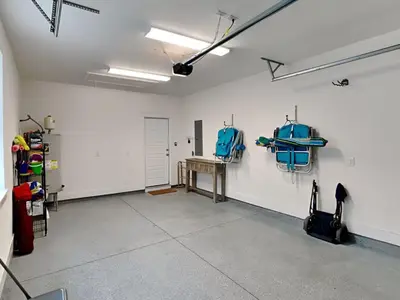 a room with two blue bags hanging on the wall at Sun Kissed Memories in Panama City Beach