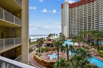 an aerial view of a resort with a pool and the ocean at Shores of Panama 328 - Low Floor HUGE 3 BedroomBunk Room, Reserved Parking, condo in Panama City Beach