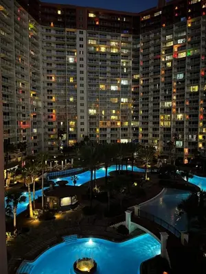 a view of a large building at night at Shores of Panama 2327 - 1 BedroomBunks and Sleeper Sofa, Sunset View! Free Fun! condo in Panama City Beach