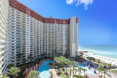 an aerial view of a resort with a pool and the beach at Shores of Panama 808- 1 BedroomBunk Room, Free Fun! Updated! Sleeps 6, condo in Panama City Beach