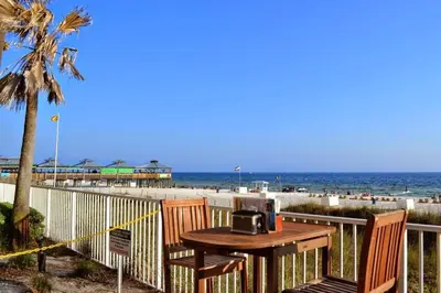 a table with a radio sitting on top of a beach at Shores of Panama 314 - 1 BdBunks, Sleeps 6, Same Level Parking, Free Fun! condo in Panama City Beach