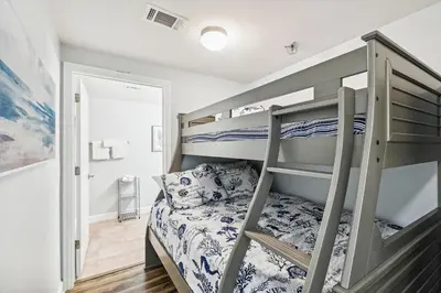 a bedroom with a bunk bed and a bunk bed at Shores of Panama 630-1BdBunks, Sleeps 6, Beach Front! Free Fun! Reserved Parking Space condo in Panama City Beach