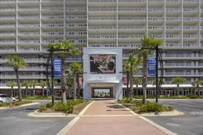 a parking lot in front of a large building at Laketown Wharf 835 - Very Cool 1 BedroomBunks, Sleeps 6, Free Fun! condo in Panama City Beach