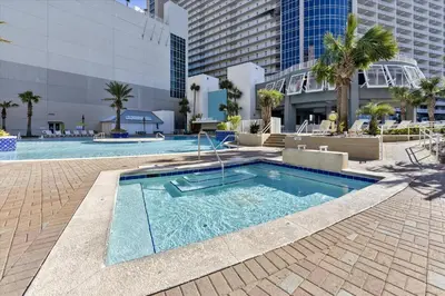 a swimming pool in the middle of a building at Laketown Wharf 835 - Very Cool 1 BedroomBunks, Sleeps 6, Free Fun! condo in Panama City Beach