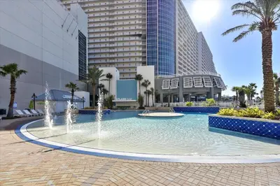 a large pool with fountains in front of a building at Laketown Wharf 835 - Very Cool 1 BedroomBunks, Sleeps 6, Free Fun! condo in Panama City Beach