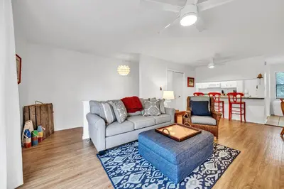 a living room with a couch and a chair at Cassine Gardens 112- 30A Imagine Ocean in Santa Rosa Beach