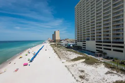 an aerial view of a beach with buildings and the ocean at Ocean Reef 1106 - Lazy Daze in Panama City Beach
