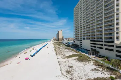 an aerial view of a beach with a building at Ocean Reef 1106 - Lazy Daze in Panama City Beach
