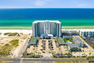 an aerial view of a hotel and the beach at Stunning 2/2 Designer Condo w Coastal Appeal Right on the Gulf! in Panama City Beach