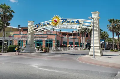 a large building with a sign for a theme park at Calypso 3-903 - Emerald Getaway in Panama City Beach