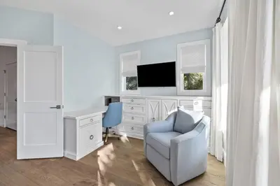 a white room with a desk and a chair at Peaceful Easy Feeling - 156 Chivas Lane, Unit B home in Santa Rosa Beach