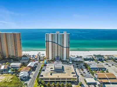 an aerial view of a city with the beach and buildings at Seychelles 1302 by InJoy Vacations in Panama City Beach