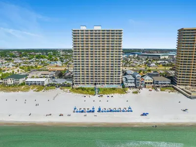 an aerial view of a beach with tall buildings at Seychelles 1302 by InJoy Vacations in Panama City Beach
