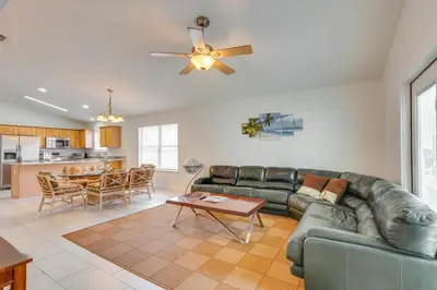 a living room with a couch and a table at 1 Mi to Beach Family-Friendly Home in PCB! in Panama City Beach
