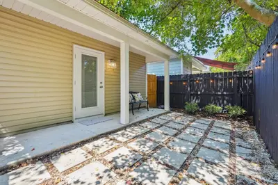 a front porch of a house with a fence at Panama City Beach Vacation Rental about 1 Mi to Beach! in Panama City Beach