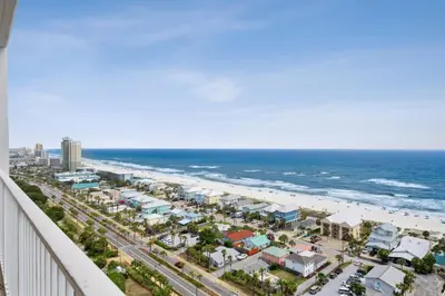 a view of the beach from the balcony of a condo at Laketown Wharf #1707 by Nautical Properties in Panama City Beach