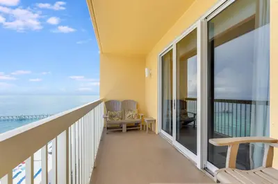 a balcony with a view of the ocean at Calypso Resort Serenity 1 in Panama City Beach