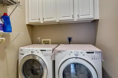 a laundry room with a washer and dryer at Pet-Friendly Panama City Beach Home Near Beaches! in Panama City Beach
