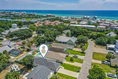 an aerial view of a residential neighborhood with a house at Sand's Hideaway in Panama City Beach