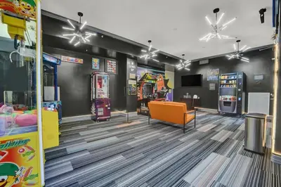 a childrens store with a play room with a video game at Gulfcrest 206 in Panama City Beach